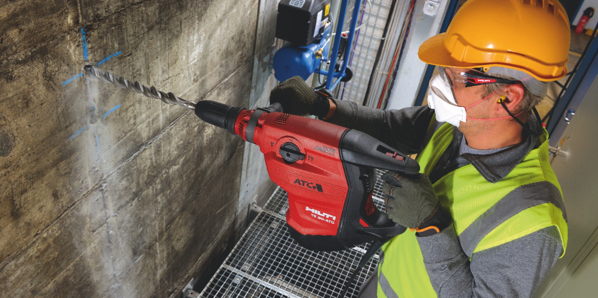 Construction worker using a TE 80-ATC/AVR Corded combihammer  with Active Torque Control (ATC) to help prevent kickback